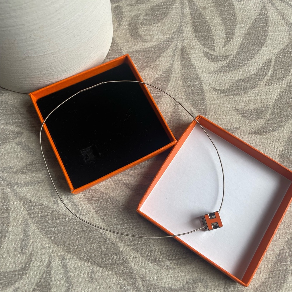 Hermès Orange Cage D’H Cube necklace with Box